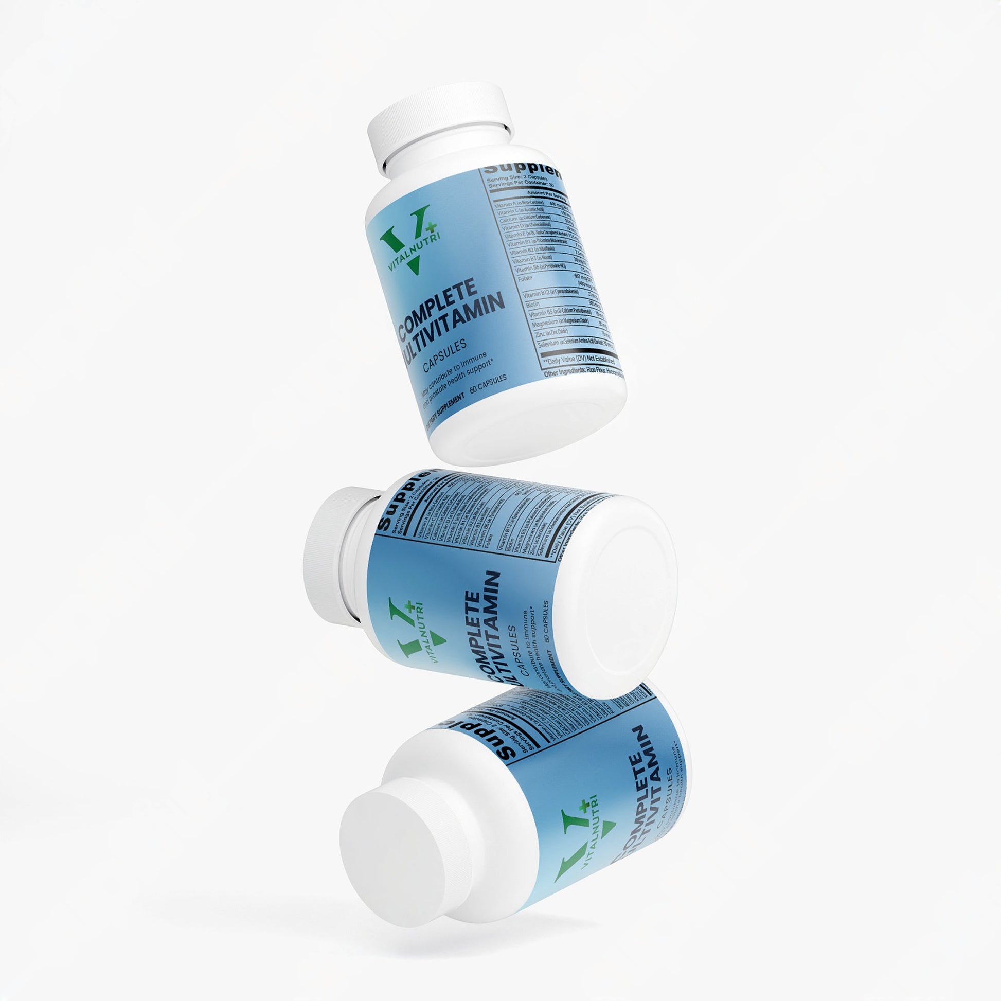 Three bottles of a vitamin supplement on a white background